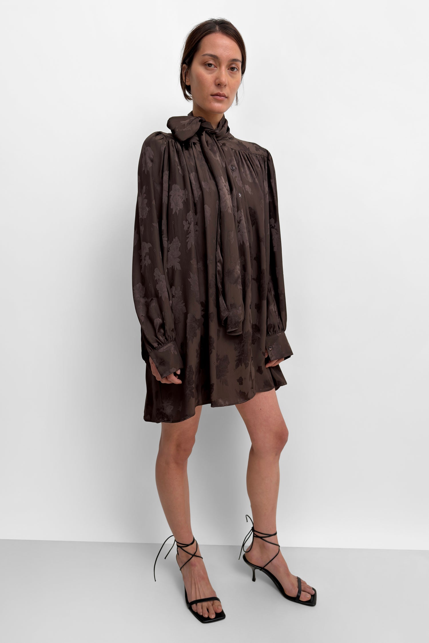The Nayou monochrome jaqcuard mini bow tie dress